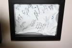 Onesie signed by baby shower guests