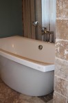 Kohler Escale line freestanding tub and Roman faucet in our Master Bathroom