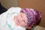 Sophia received a donated knit hat from the mother/baby unit