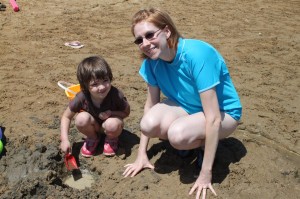 Linda and Lydia making sand castles